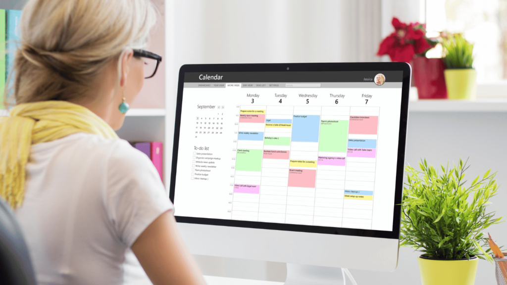 Remote work calendar on screen being checked out by remote workers