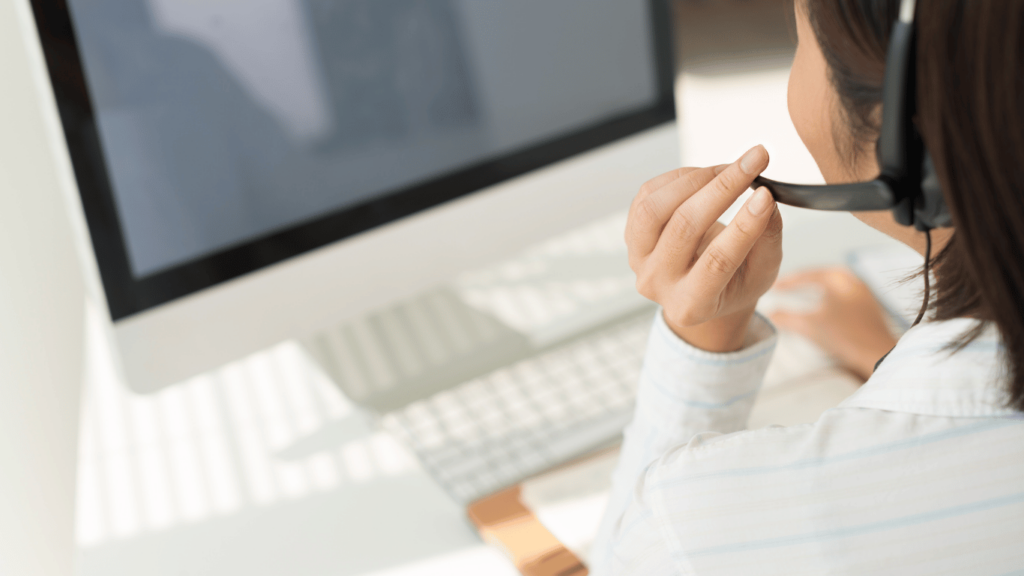 Human customer support agent operating chatbot